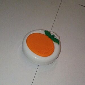 Comb with Mirror With Orange Fruit Decoration.